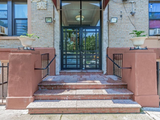 550 W 153rd St Unit 41, New York Manhattan, NY 10031 - property entrance with brick siding and french doors