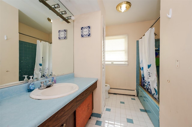 3929 Greentree Dr, Oceanside, NY 11572 - bathroom with a baseboard radiator, toilet, vanity, tile patterned floors, and shower / tub combo