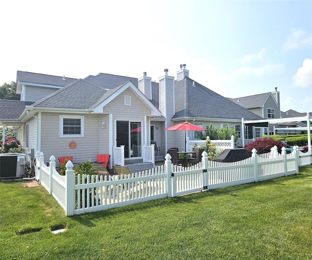 107 Scenic Lake Dr Unit 107, Riverhead, NY 11901 - rear view of property with cooling unit and a shingled roof
