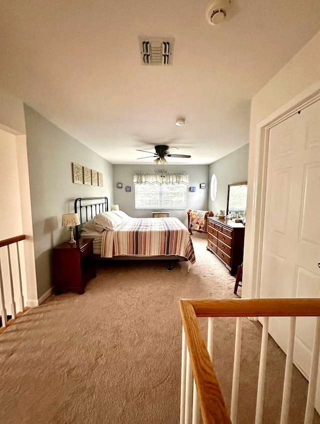 107 Scenic Lake Dr Unit 107, Riverhead, NY 11901 - bedroom with light carpet and a ceiling fan