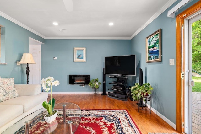 25 Glacier Dr, Smithtown, NY 11787 - living room featuring wood finished floors, baseboards, crown molding, and recessed lighting