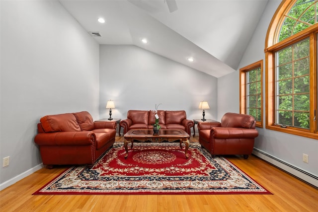 25 Glacier Dr, Smithtown, NY 11787 - living room featuring a baseboard heating unit, wood finished floors, recessed lighting, baseboards, and ceiling fan