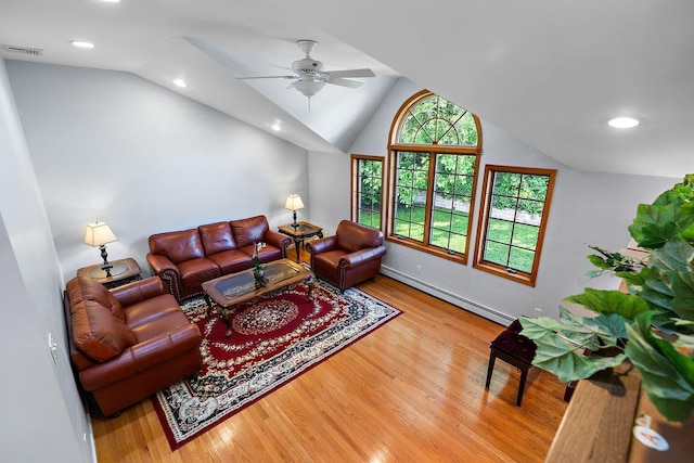 25 Glacier Dr, Smithtown, NY 11787 - living room with a baseboard radiator, wood finished floors, lofted ceiling, ceiling fan, and recessed lighting