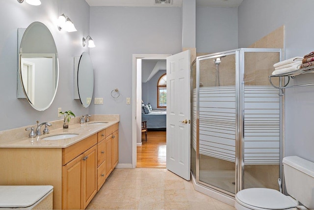 25 Glacier Dr, Smithtown, NY 11787 - ensuite bathroom featuring toilet, double vanity, a shower stall, and marble finish floors