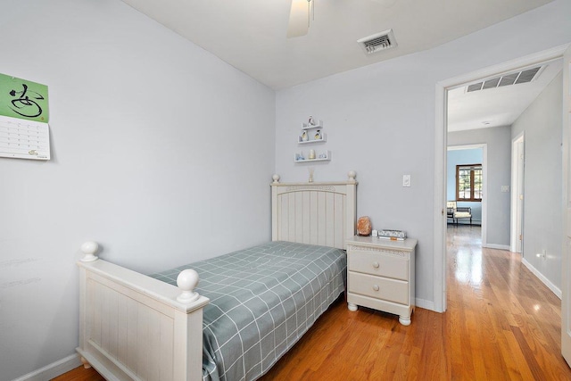 25 Glacier Dr, Smithtown, NY 11787 - bedroom featuring wood finished floors, baseboards, and a ceiling fan