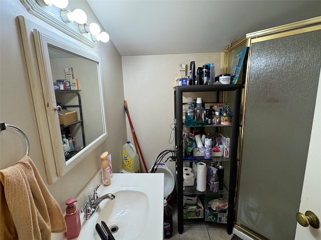 510 7th St, West Hempstead, NY 11552 - bathroom with a stall shower and tile patterned flooring