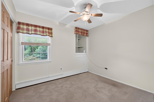 69 Crafts Rd, Carmel, NY 10512 - spare room featuring a baseboard heating unit, carpet flooring, and ceiling fan