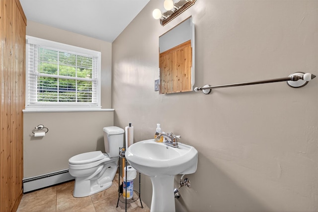 69 Crafts Rd, Carmel, NY 10512 - bathroom with a baseboard heating unit and tile patterned floors