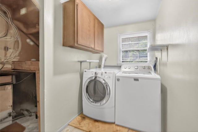 69 Crafts Rd, Carmel, NY 10512 - washroom featuring cabinet space and washer and clothes dryer