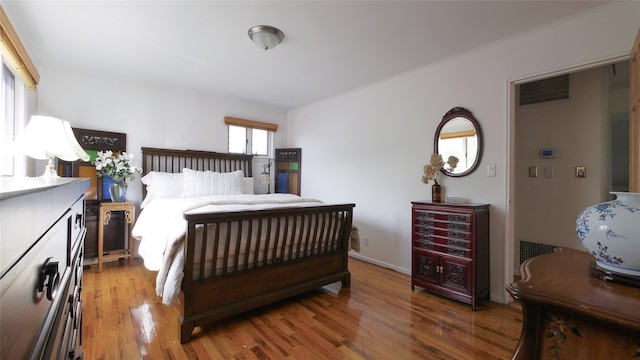 1651 201st St, Bayside, NY 11360 - bedroom featuring light wood-style flooring and baseboards