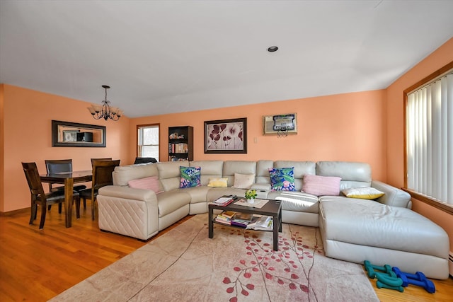 4539 192nd St, Flushing, NY 11358 - living room with a chandelier and wood finished floors