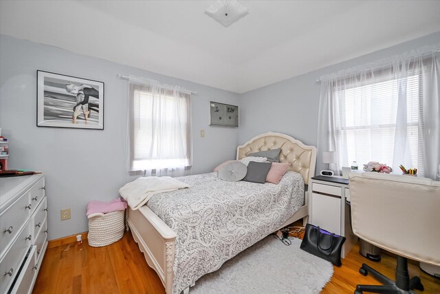4539 192nd St, Flushing, NY 11358 - bedroom featuring light wood-style flooring and baseboards