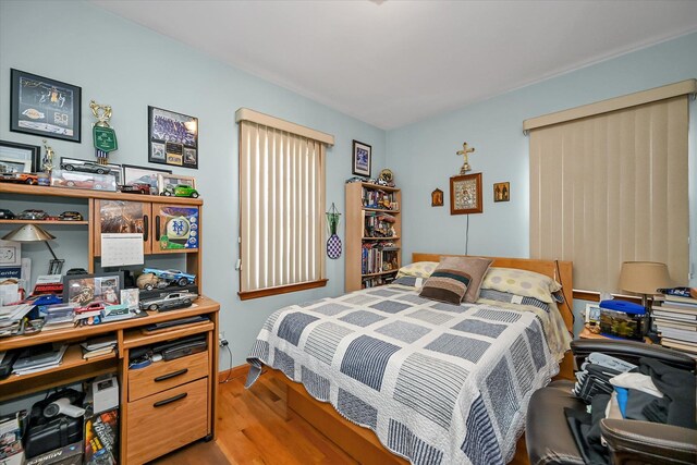 4539 192nd St, Flushing, NY 11358 - bedroom featuring wood finished floors and baseboards