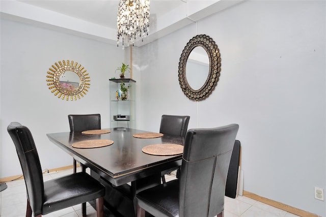 99-40 63rd Rd Unit 9Z, Rego Park, NY 11374 - dining space with light tile patterned flooring, a chandelier, and baseboards