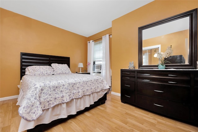 99-40 63rd Rd Unit 9Z, Rego Park, NY 11374 - bedroom featuring light wood-style flooring, baseboards, and lofted ceiling