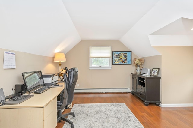 7 Dawn Dr, East Northport, NY 11731 - home office featuring baseboard heating, wood finished floors, and vaulted ceiling