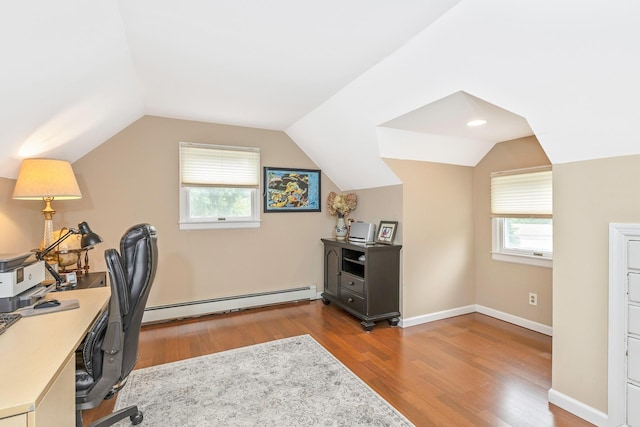 7 Dawn Dr, East Northport, NY 11731 - office featuring a baseboard heating unit, wood finished floors, plenty of natural light, vaulted ceiling, and baseboards