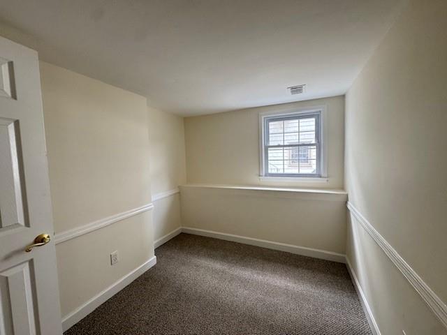 20817 15th Rd, Bayside, NY 11360 - spare room with carpet and baseboards