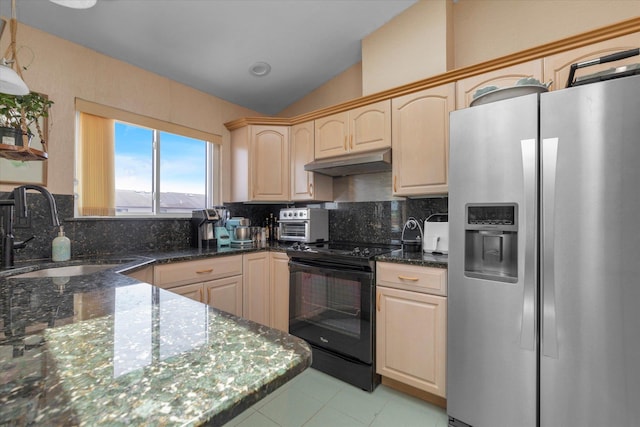 1 Anchorage Way Unit 704, Freeport, NY 11520 - kitchen with stainless steel refrigerator with ice dispenser, black electric range, under cabinet range hood, vaulted ceiling, and decorative backsplash