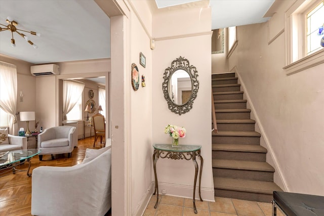 48-46 206th St Unit 2, Bayside, NY 11364 - staircase featuring a wall mounted AC and baseboards