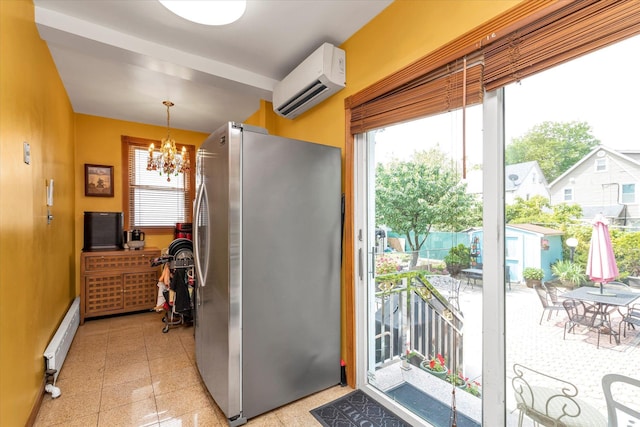 48-46 206th St Unit 2, Bayside, NY 11364 - kitchen with a wall mounted AC, freestanding refrigerator, a chandelier, and healthy amount of natural light