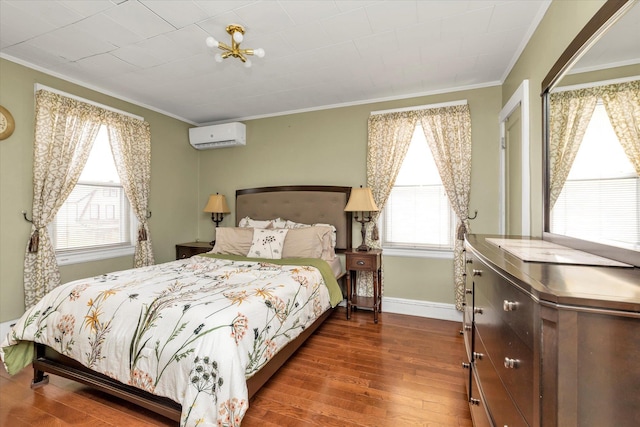 48-46 206th St Unit 2, Bayside, NY 11364 - bedroom featuring crown molding, hardwood / wood-style floors, an AC wall unit, and baseboards