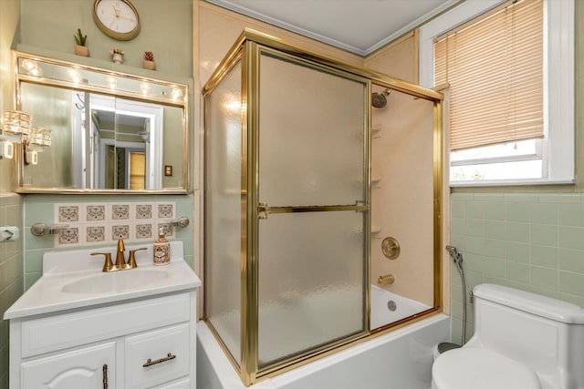 48-46 206th St Unit 2, Bayside, NY 11364 - full bathroom featuring tile walls, vanity, toilet, and enclosed tub / shower combo