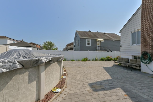 162-29 95th St, Howard Beach, NY 11414 - view of patio featuring an outdoor living space