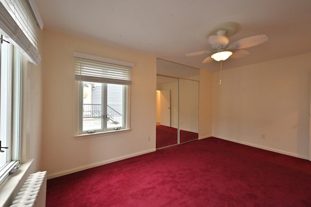 162-29 95th St, Howard Beach, NY 11414 - unfurnished bedroom with radiator, carpet flooring, a closet, and ceiling fan
