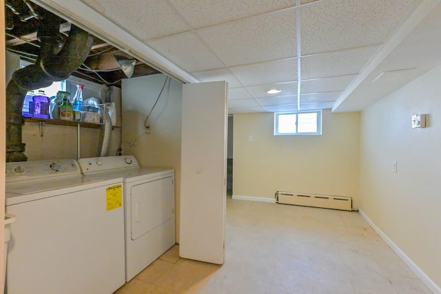 162-29 95th St, Howard Beach, NY 11414 - laundry room with a baseboard heating unit and washing machine and dryer