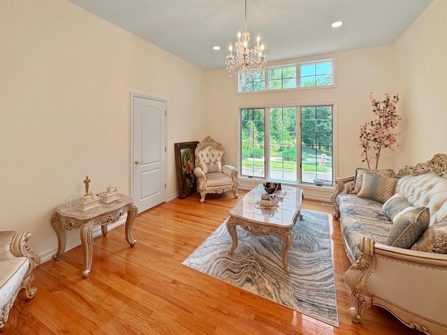 91 Harbor Rd, Head Of The Harbor, NY 11780 - living room with a chandelier, light wood-style floors, recessed lighting, and baseboards