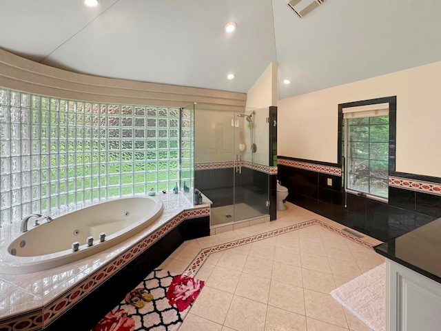 91 Harbor Rd, Head Of The Harbor, NY 11780 - full bathroom with a stall shower, a jetted tub, tile patterned flooring, lofted ceiling, and vanity