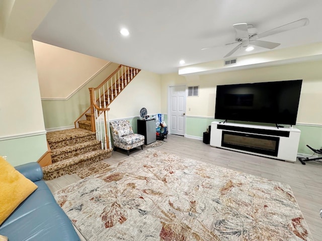 91 Harbor Rd, Head Of The Harbor, NY 11780 - living area with stairs, a ceiling fan, wood finished floors, recessed lighting, and baseboards