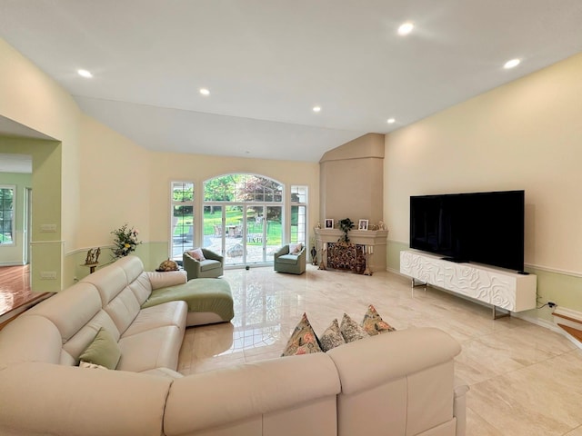 91 Harbor Rd, Head Of The Harbor, NY 11780 - tiled living room with vaulted ceiling, recessed lighting, and baseboards
