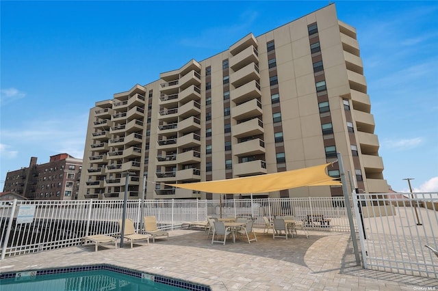 360 Shore Rd Unit 4B, Long Beach, NY 11561 - view of pool with a patio area