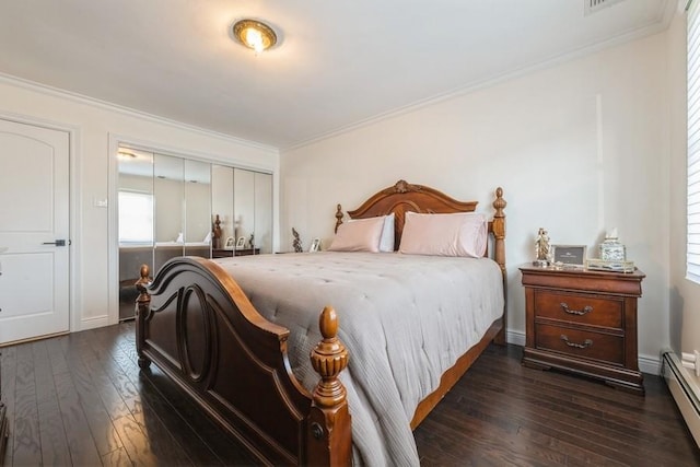 696 Byron Ave, Franklin Square, NY 11010 - bedroom featuring a baseboard heating unit, dark wood-style floors, ornamental molding, multiple windows, and a closet