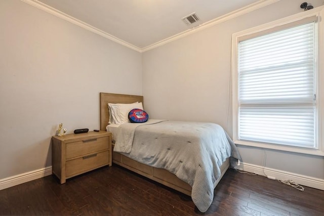 696 Byron Ave, Franklin Square, NY 11010 - bedroom with baseboards, crown molding, and dark wood finished floors
