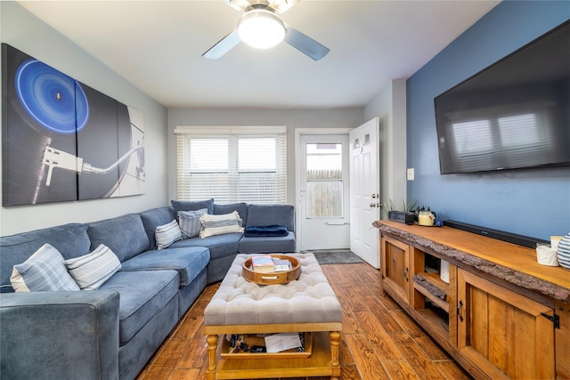 721 E Walnut St, Long Beach, NY 11561 - living area featuring dark wood finished floors and ceiling fan