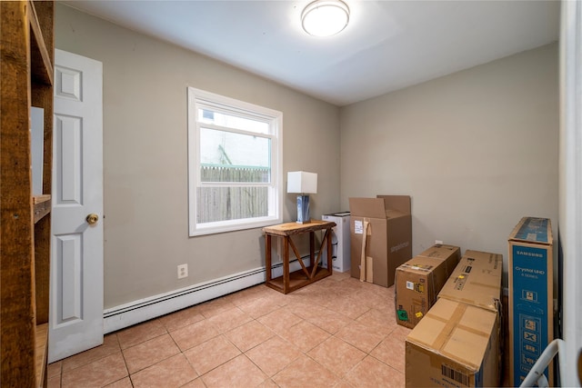 721 E Walnut St, Long Beach, NY 11561 - interior space featuring light tile patterned floors and baseboard heating