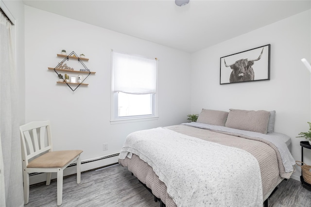 721 E Walnut St, Long Beach, NY 11561 - bedroom with wood finished floors and a closet