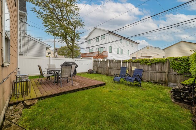 721 E Walnut St, Long Beach, NY 11561 - view of yard featuring a deck and outdoor dining space
