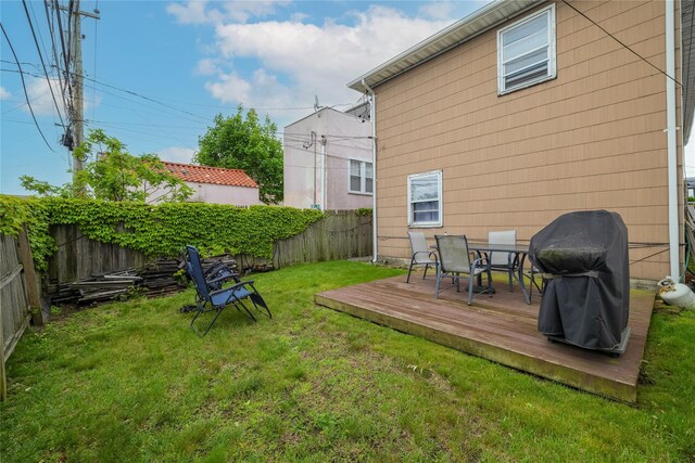 721 E Walnut St, Long Beach, NY 11561 - view of yard featuring a deck and outdoor dining area