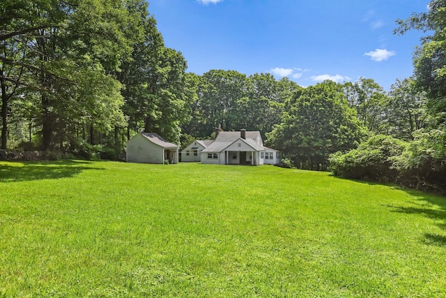 3868 Indian Hill Rd, Shrub Oak, NY 10588 - view of grassy yard featuring an outdoor structure