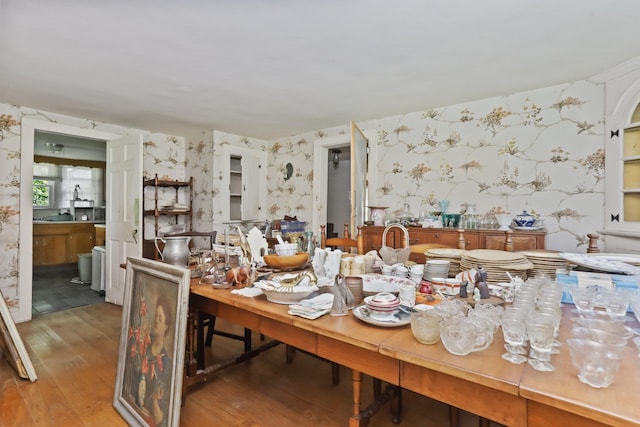 3868 Indian Hill Rd, Shrub Oak, NY 10588 - dining space with wallpapered walls and wood finished floors