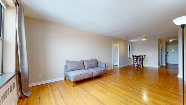 65-35 108th St Unit D7, Forest Hills, NY 11375 - sitting room with light wood-style floors and baseboards