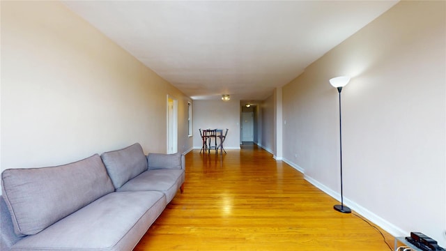 65-35 108th St Unit D7, Forest Hills, NY 11375 - living area featuring light wood-type flooring and baseboards