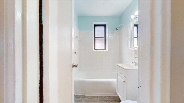 65-35 108th St Unit D7, Forest Hills, NY 11375 - full bathroom with vanity, bathing tub / shower combination, and wood finished floors