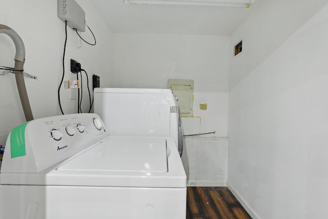 73 Fox Pl, Hicksville, NY 11801 - laundry area featuring washing machine and clothes dryer, wood finished floors, and baseboards