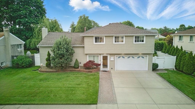 73 Fox Pl, Hicksville, NY 11801 - view of front of property with a garage, concrete driveway, a shingled roof, and a gate