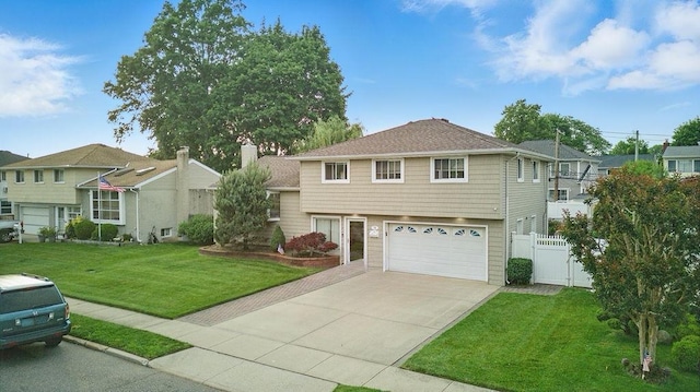 73 Fox Pl, Hicksville, NY 11801 - split level home with a garage and driveway